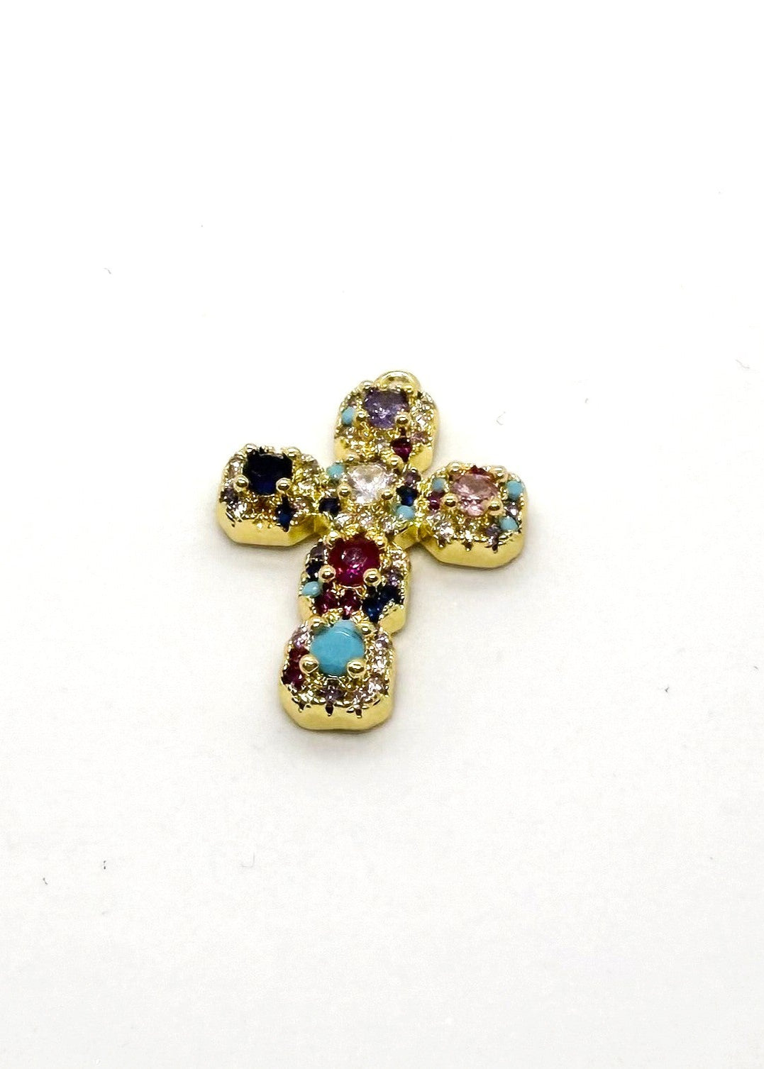 Gold stainless steel  cross charm with colorful gemstones on a white background