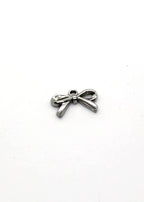 Silver Stainless steel bow-shaped charm on a white background