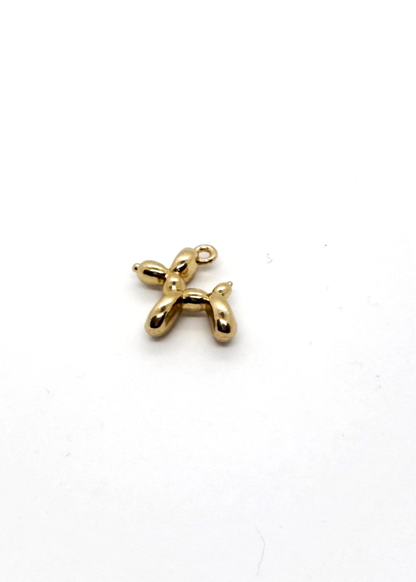 Gold Stainless steel Balloon dog charm on white background