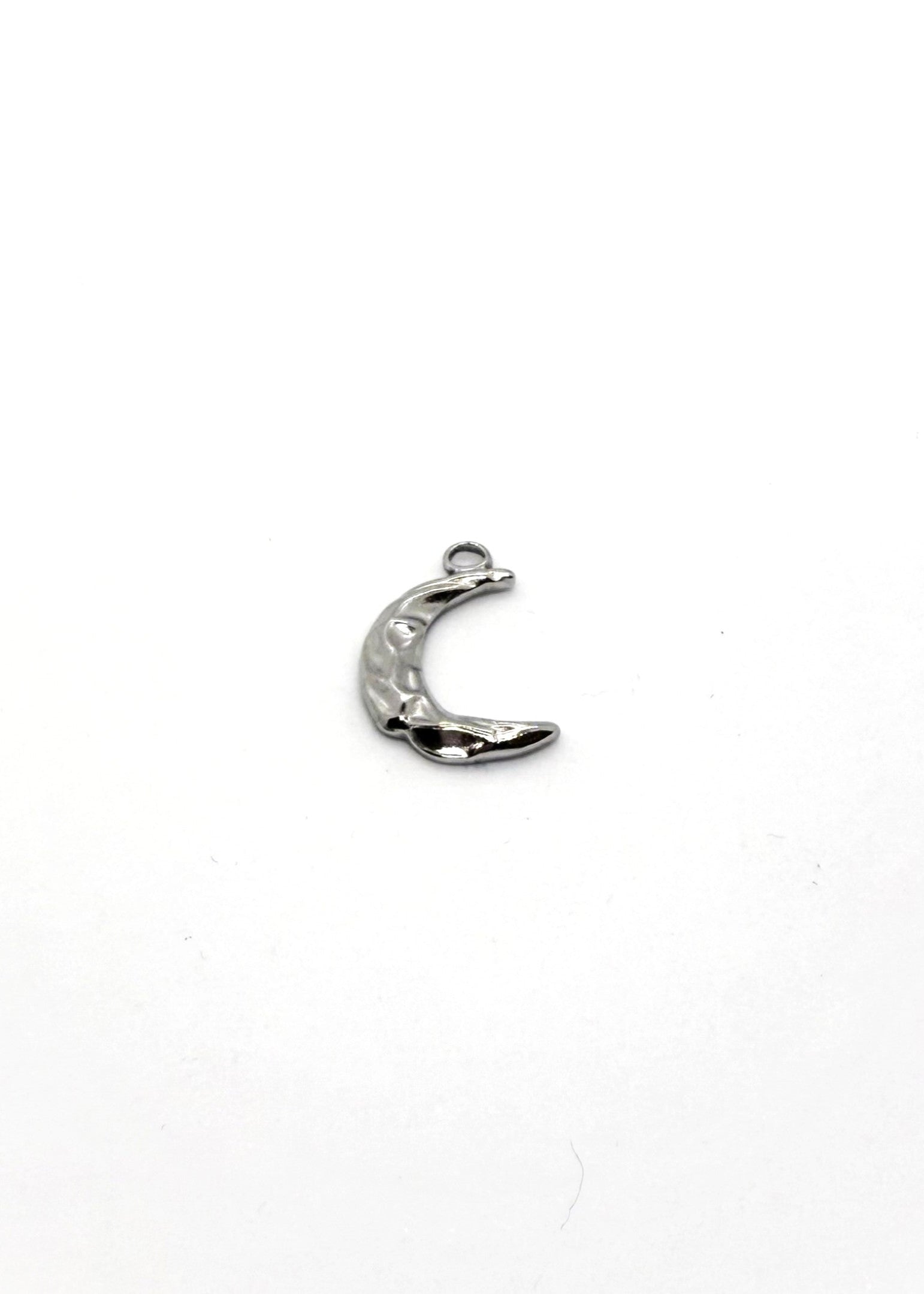stainless steel in silver crescent moon charm on a white background