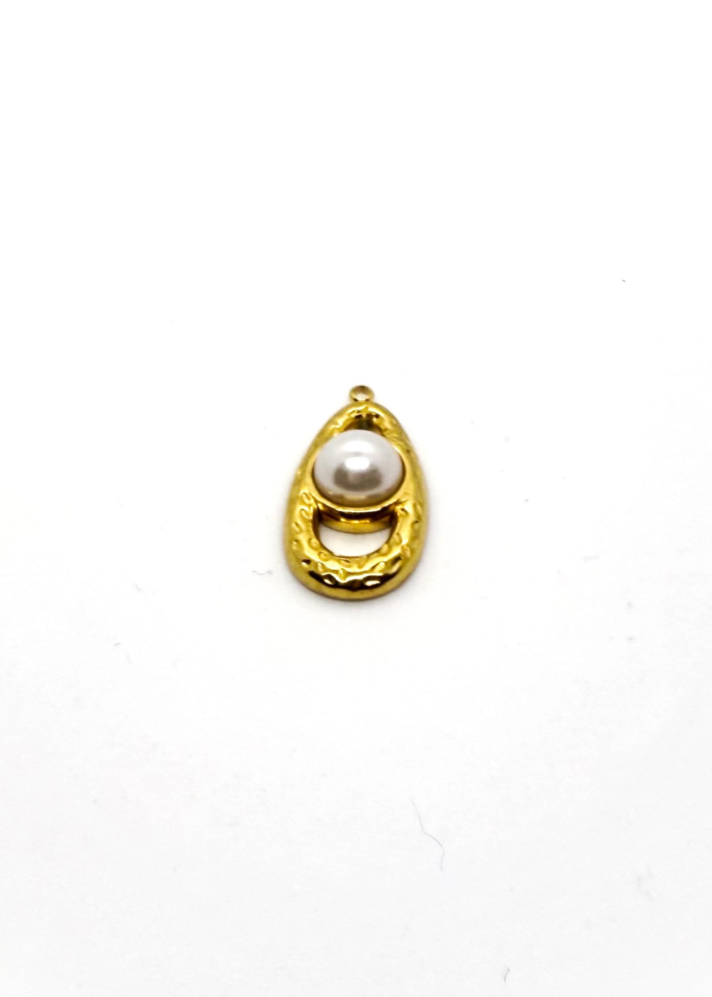 Gold stainless steel charm with a pearl on a white background