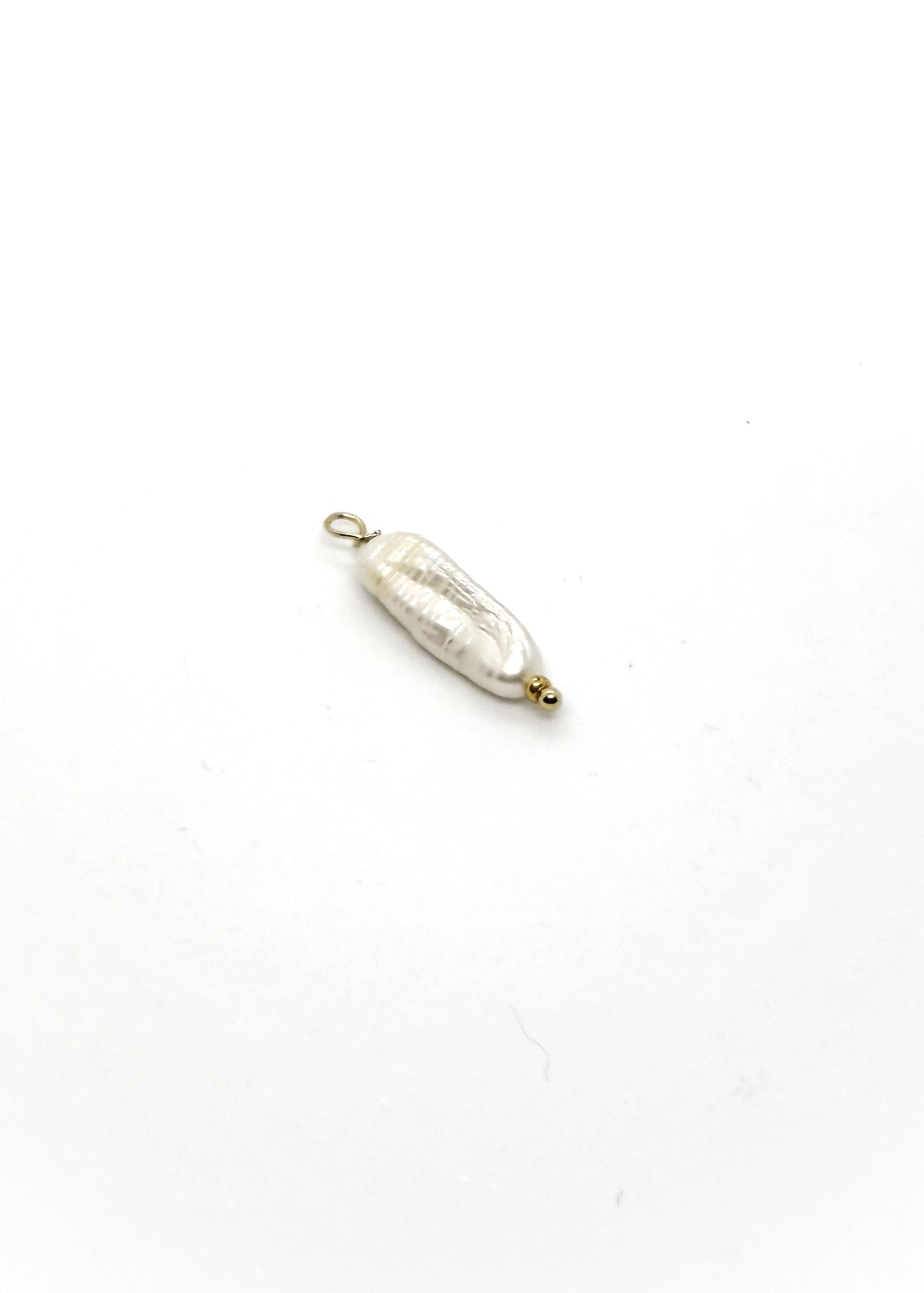 Pearl-like pendant on a white background