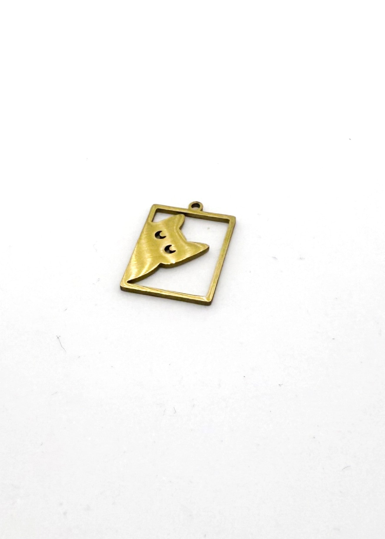 Gold stainless steel big cat charm on white background