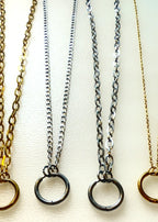 multiple chain on a white background with a ring charm holder